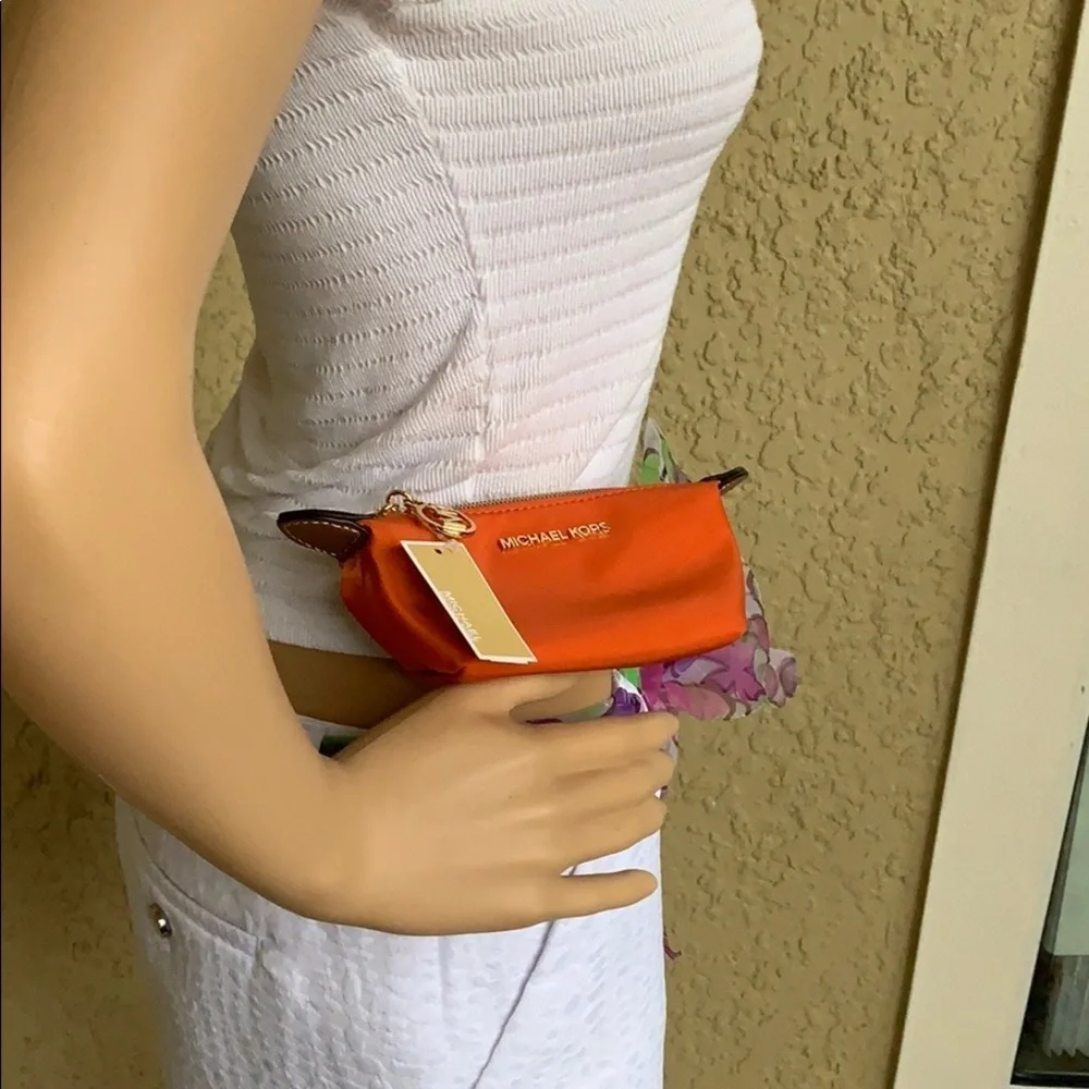 MICHAEL KORS TRAVEL XS POUCH TANGERINE - Picture 2 of 16